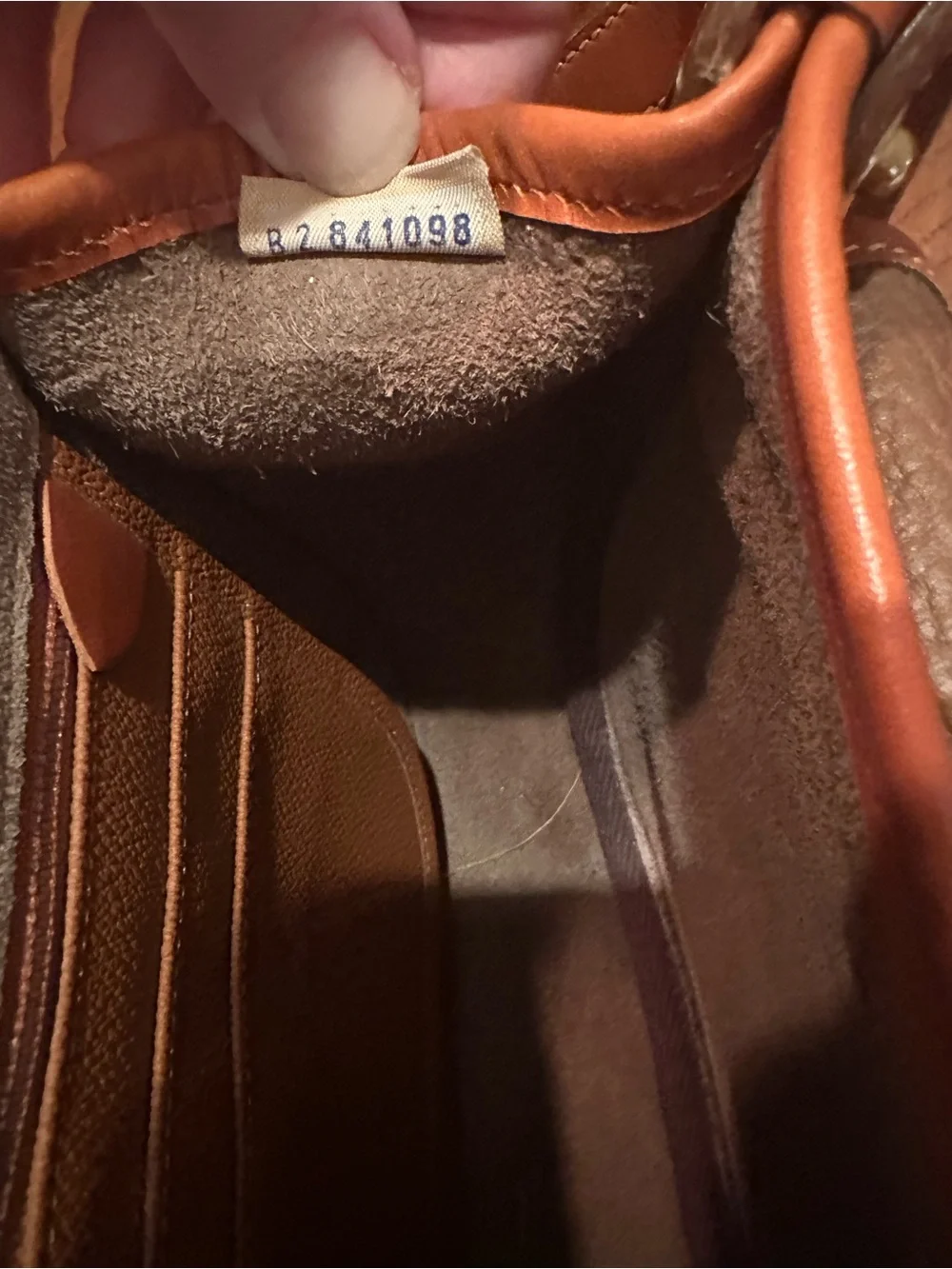 Dooney & Bourke Brown Pebbled Leather Horseshoe Crossbody with Tan Trim